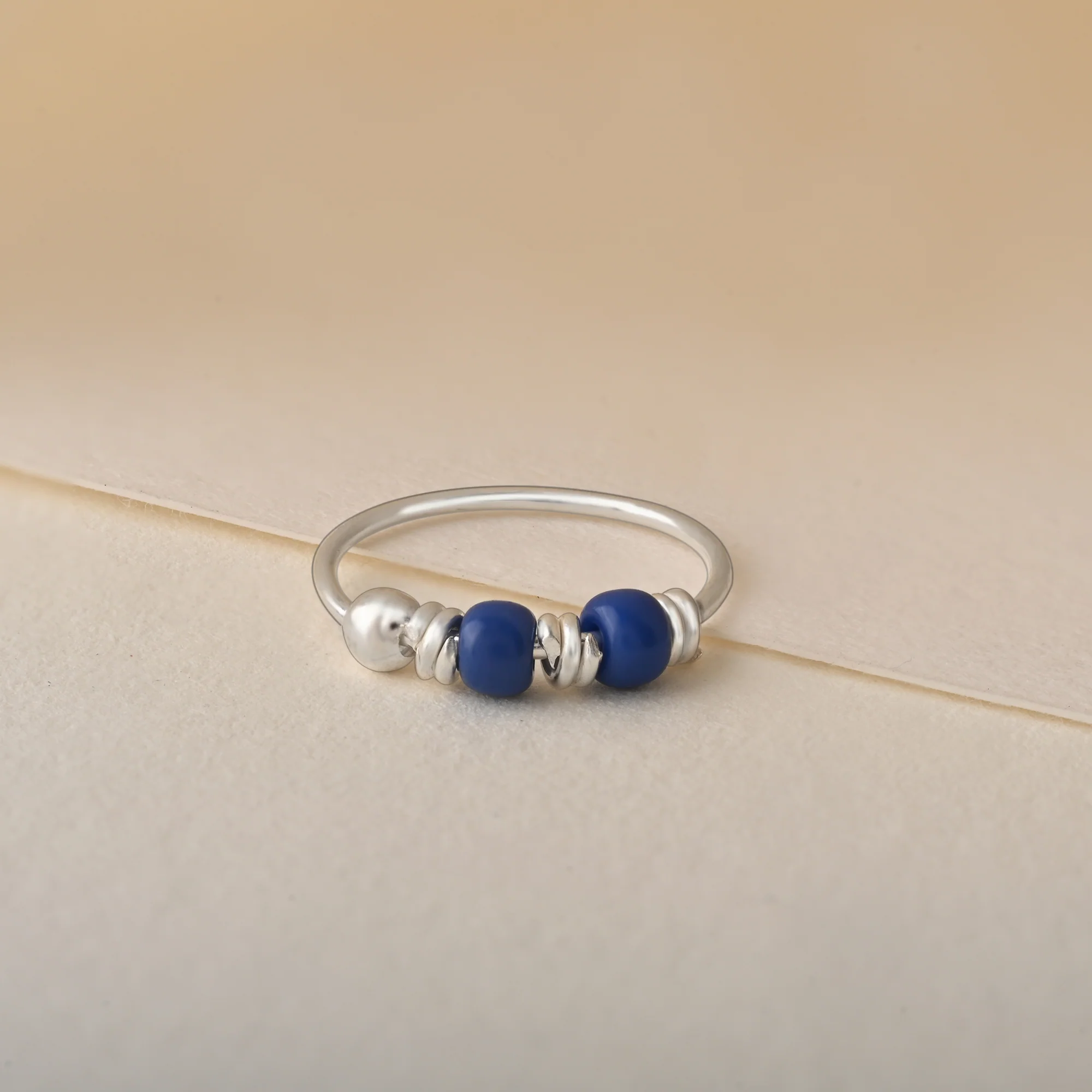 Small Blue Bead Nose Ring - Image 3